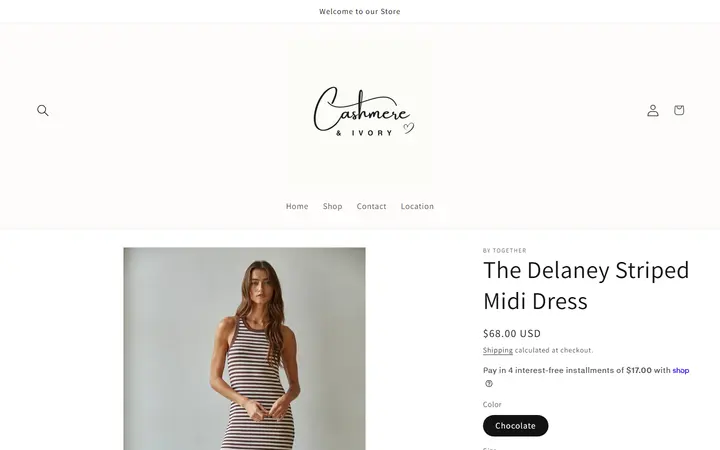 Website page titled The Delaney Striped Midi Dress – Cashmere & Ivory Boutique