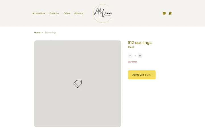 Website page titled $12 earrings | AdiLuna Boutique Site