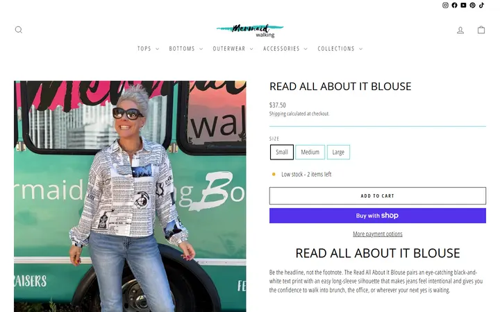 Website page titled Black and White Printed Blouse | Read All About It | Mermaid – Mermaid Walking Boutique