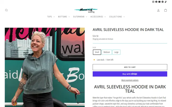 Website page titled Dark Teal Sleeveless Hoodie | Avril Pullover | Mermaid Walking – Mermaid Walking Boutique