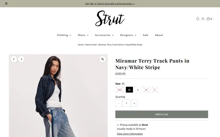 Website page titled rag & bone Miramar Terry Track Pants in Navy/White Stripe – Strut Boutique