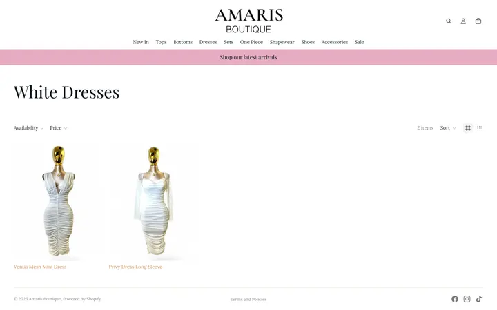 Website page titled White Dresses – Amaris Boutique