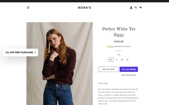 Website page titled Perfect White Tee Ziggy – Nora’s