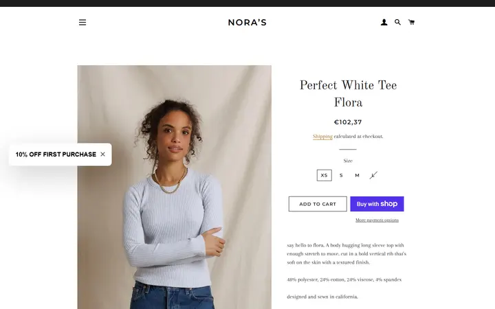 Website page titled Perfect White Tee Flora – Nora’s