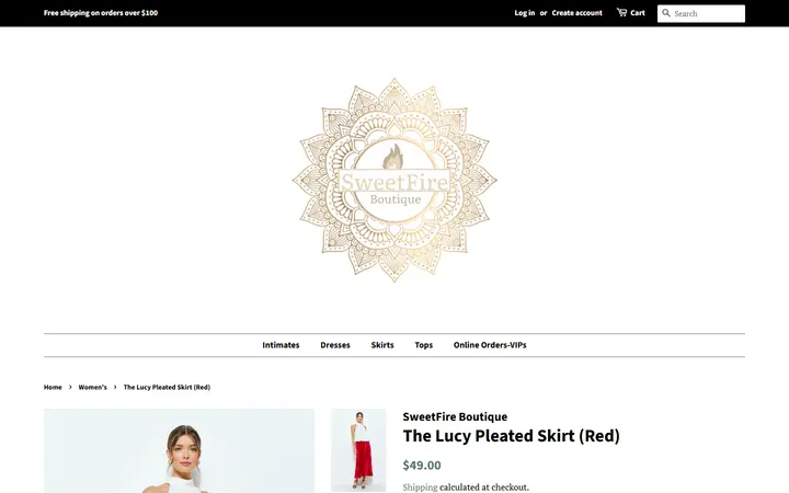 Website page titled The Lucy Pleated Skirt (Red) – SweetFire Boutique