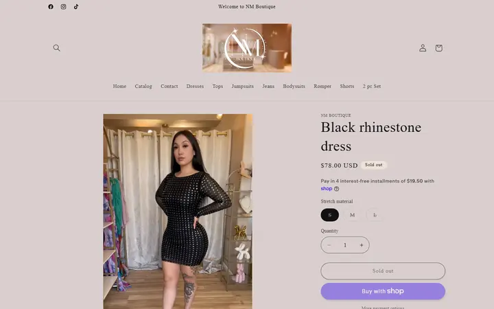 Website page titled Black rhinestone dress – NM Boutique