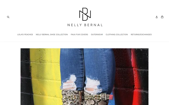 Website page titled Animaal Nude Snake Printed Booties With Gold Ornaments – nellybernalcollection.com