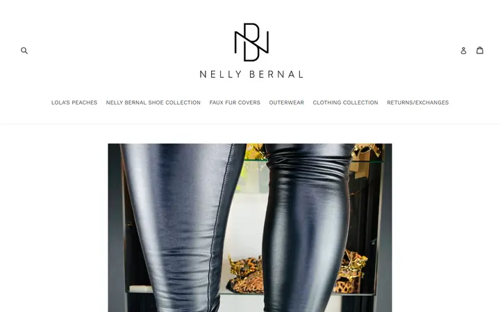 Website page titled Grind Silver Booties With Rhinestones and Studs – nellybernalcollection.com