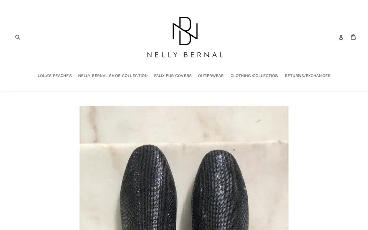 Website page titled Disco Queen Black Rhinestone Loafers – nellybernalcollection.com