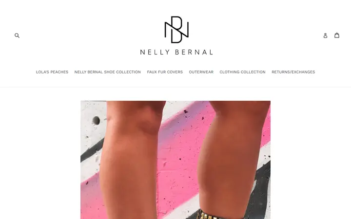 Website page titled Navaeh Black Heels W Gold Studs LAST SIZE 36 – nellybernalcollection.com