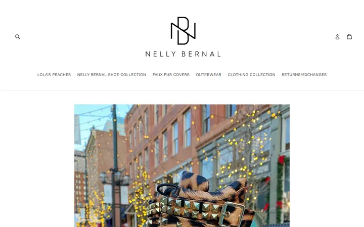 Website page titled Kenya Leopard Printed Boots – nellybernalcollection.com