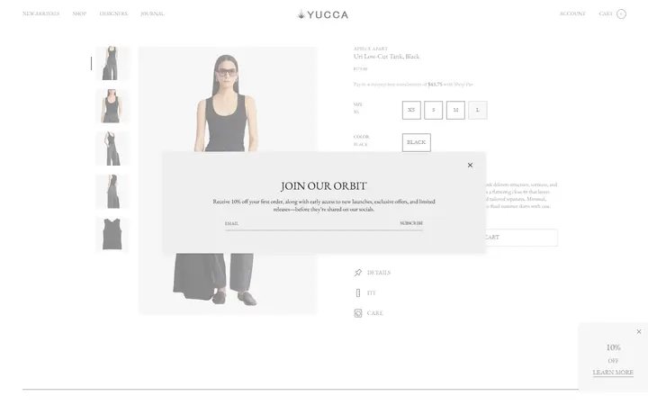 Website page titled Uri Low-Cut Tank Black | Apiece Apart | SHOP YUCCA